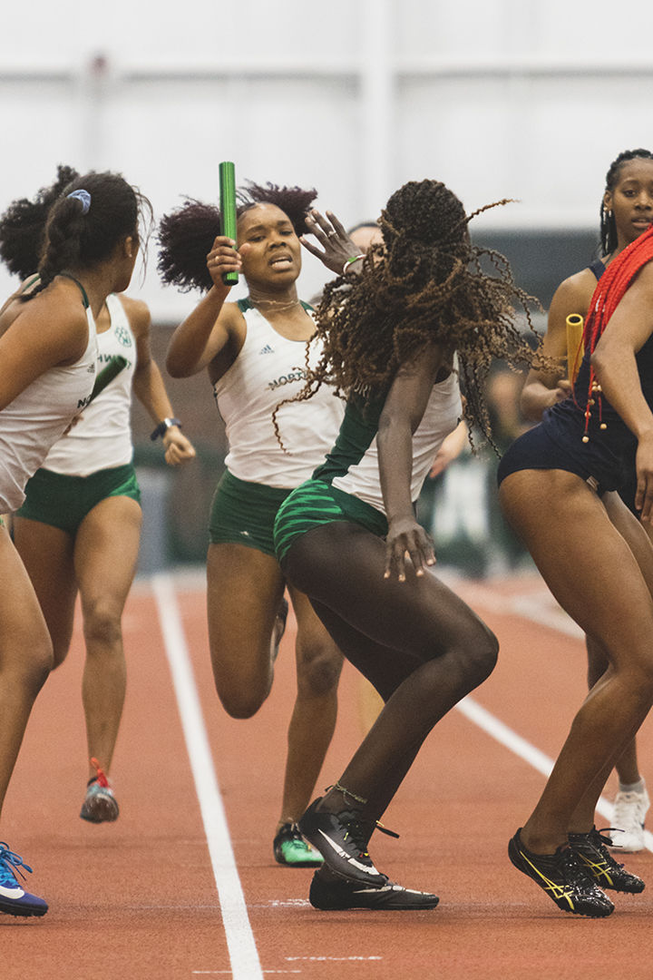 Women's track handoff